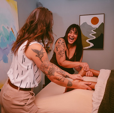 Laughing foot massage couples massage class couples goals.jpg