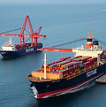 international trade image with sea and ship during at 11 AM in a port.jpg