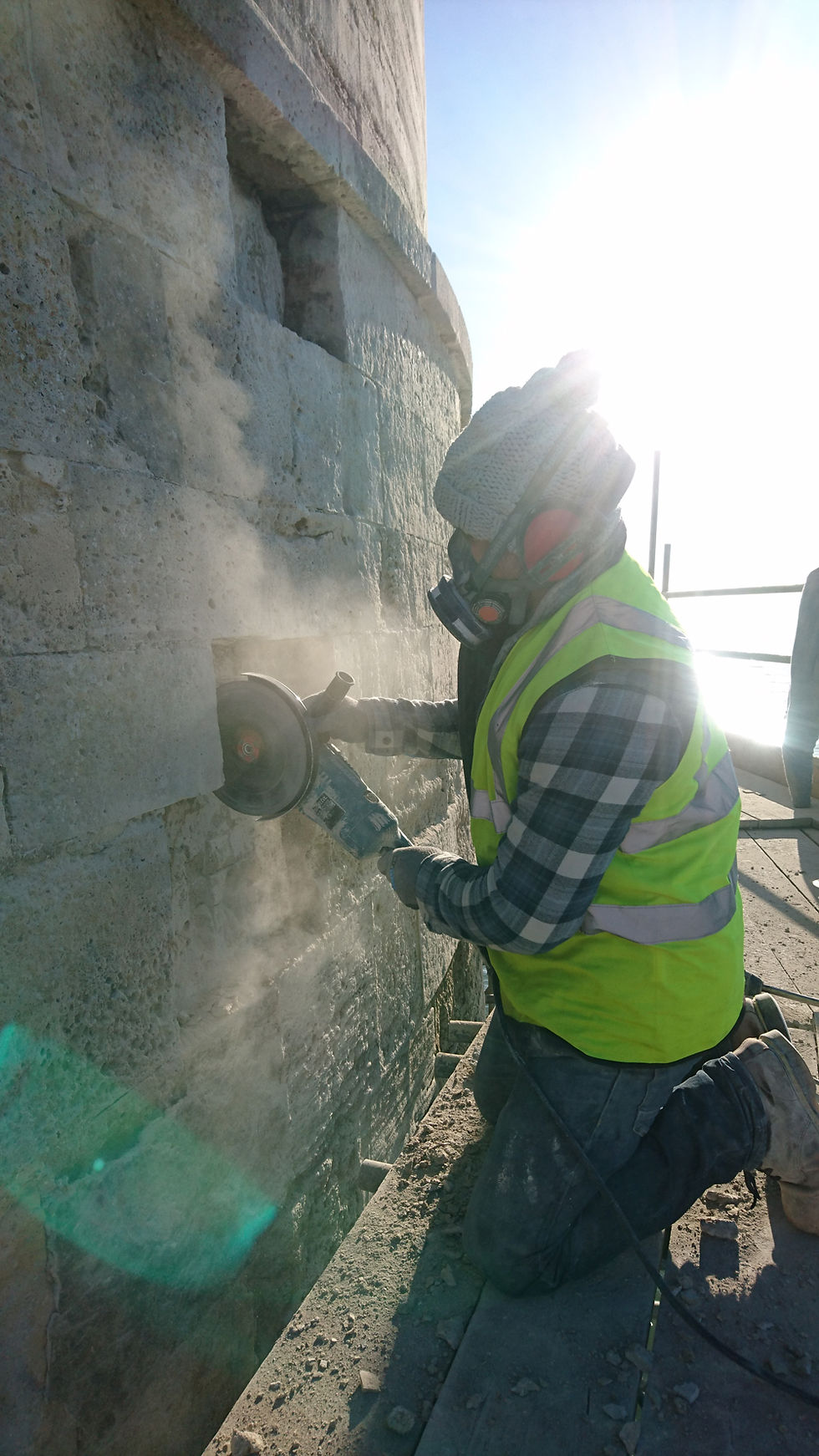 Stonemason South West England working on a lighthouse