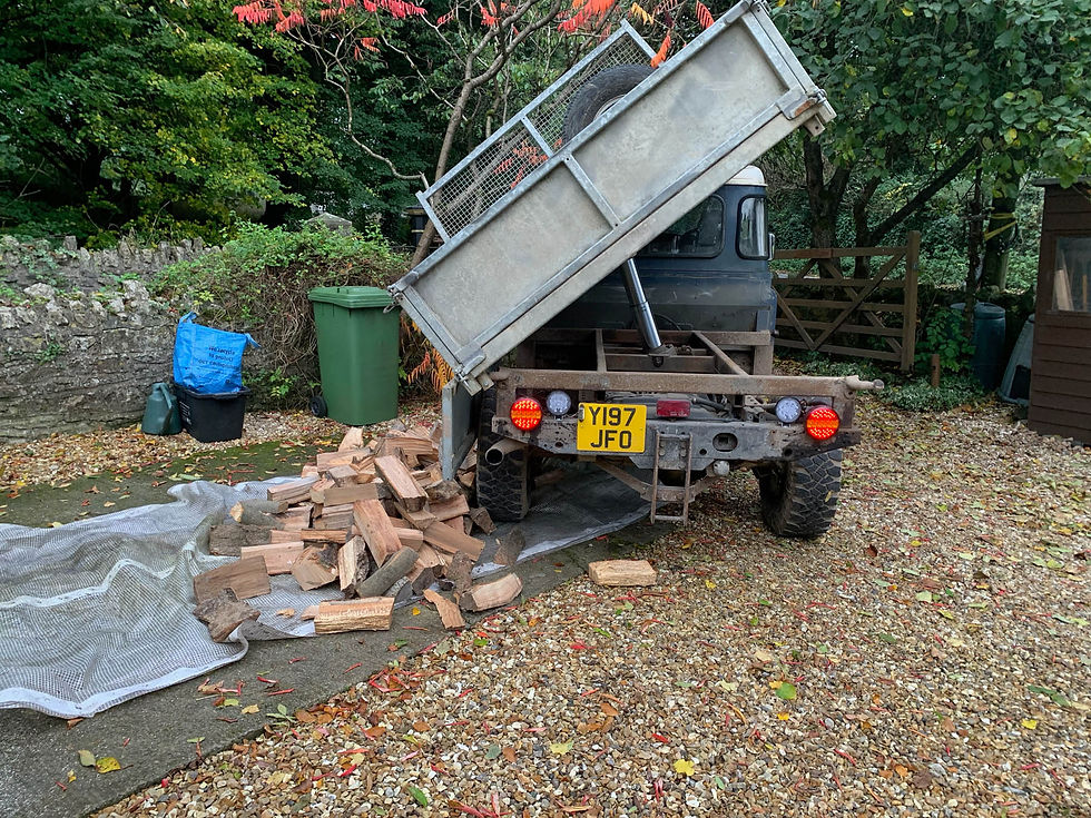 seasoned logs being delivered