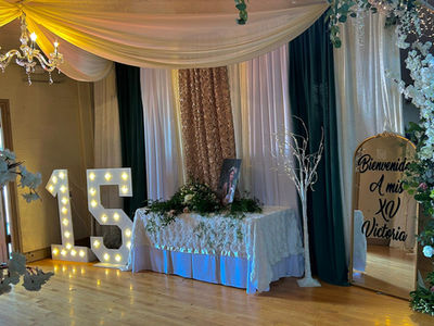 "Romantic outdoor wedding decor by Event Planning Salinas featuring floral centerpieces, elegant table setups, and premium rental services in Salinas, California."
"Vibrant quinceañera celebration with custom balloon arches, themed decorations, and stylish rentals by Event Planning Salinas in Salinas, CA."
"Whimsical baby shower setup with soft pastel décor, table arrangements, and event rentals by Event Planning Salinas, serving Salinas, California."
"Festive graduation party layout with themed balloon columns, branded decorations, and complete rental packages by Event Planning Salinas in Salinas."