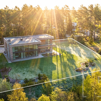 Eramu 3D render päikeseloojangus kinnisvara müügiks