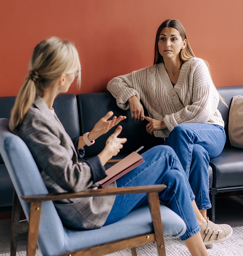 Woman receiving menopause support consultation at aesthetics clinic