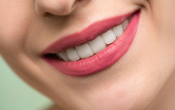 woman-with-red-lipstick-smiling-3762453.