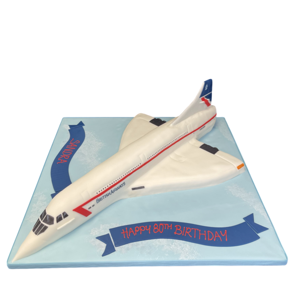 Luxurious Concorde airplane-themed celebration cake with intricate detailing and a unique design in shades of white and metallic silver, perfect for aviation enthusiasts.