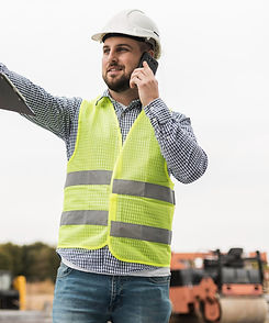 medium-shot-smiley-man-talking-phone_edited.jpg