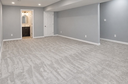 Bright, level empty basement interior.png