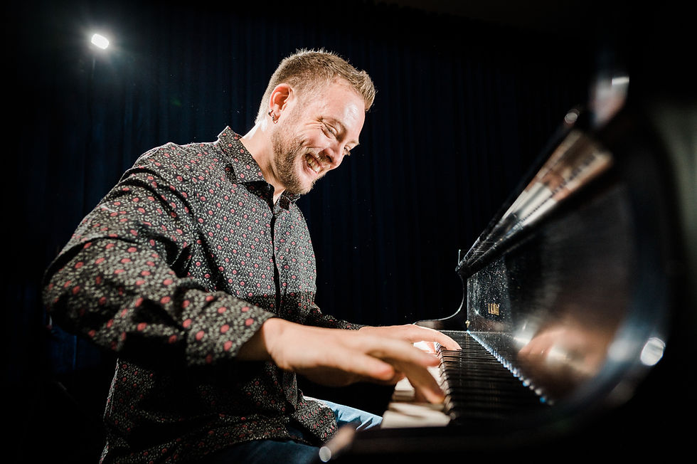 Mack Grout playing the piano live.