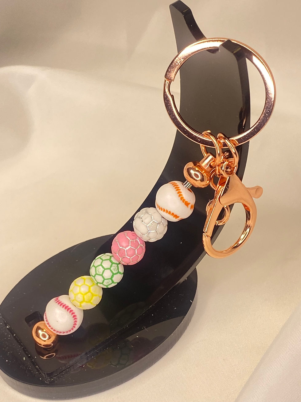 Miniatura: Portachiavi con anello e gancio, con palline rotanti. "EA"