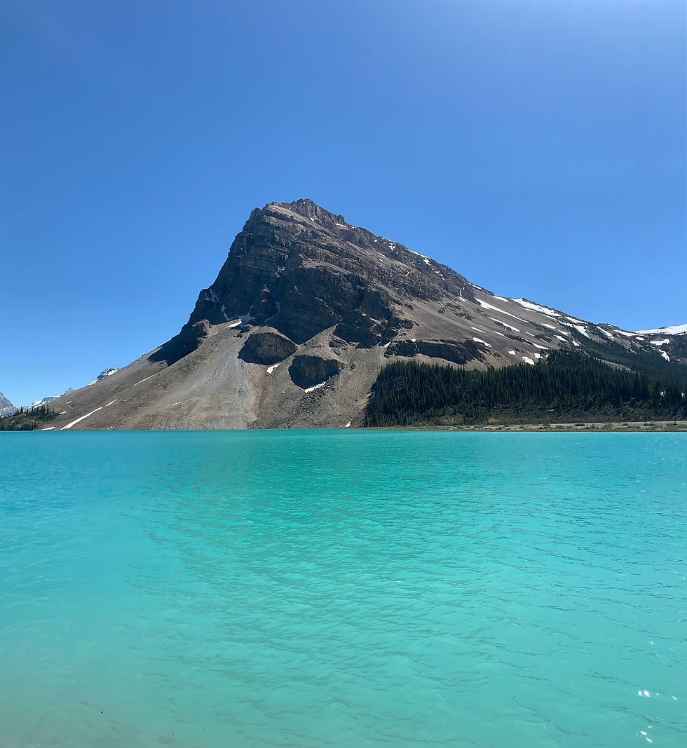 Turquoise lake with a rocky mountain