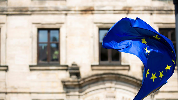 The European Union (EU) is perhaps the most notable transnational achievement in history. It has managed to create an umbrella that encompasses a diverse array of small and large nations, each with its own distinct laws, constitutions, and currencies (Rezler, 2011). Not only has it been remarkable in uniting different member states, but it has also fostered an environment in which those states are willing to relinquish parts of their sovereignty to join the EU (Rezler, 2011). One reason for this attractiveness is that the EU, in its various phases, has managed to fulfill its main goal: the preservation of peace and prosperity (Emmert & Petrović, 2014). While the latter can certainly be questioned and debated, particularly regarding the relationship between the core and the periphery, as well as the overdependence of peripheral states (Belloni, 2009), it is a fact that EU member states have experienced an unprecedentedly long period of peace and cooperation. This reality alone makes the prospect of joining this previously elite club of nations highly desirable. Nevertheless, even though the European Union has been nominally designed as an open-access organization since its founding, the enlargement process is much more complicated in practice, marked by inconsistencies and disappointments in certain cases (Emmert & Petrović, 2014). The ebbs and flows of the accession processes are nowhere more apparent than in what the EU has coined “the Western Balkans,” which includes the encircled parts of the former Yugoslavia and Albania that have not yet joined the EU (Dabrowski & Myachenkova, 2018). The entire transition process for the post-socialist countries of the Balkans has been framed by the prospect and ultimate goal of joining the EU, resulting in limited success -exemplified by the cases of Croatia and Slovenia- but also many grievances and disappointments along the way (Horvat & Štiks, 2015). In particular, several trends illustrate these challenges, from the Copenhagen criteria and the extension of conditions to join, which many perceive as moving the goalposts in the middle of the game (Rezler, 2011), to internal enlargement fatigue (Szolucha, 2010). Consequently, these inconsistencies have led to rising Euroscepticism among Western Balkan states (Belloni, 2016) and geopolitical reshuffling in the region (Panagiotou, 2021). This article will, then, critically examine the role of EU integration in the Western Balkans, its promises and failures, and potential lessons for the future. The role of the EU in the Western Balkans nation-building  The Western Balkans refers to a group of states that emerged after the collapse of Yugoslavia, with Albania included as an additional state. This term encompasses all the countries in the region that have not yet joined the EU but are at various stages of the accession process (Dabrowski & Myachenkova, 2018). Accession to the EU has been, at least nominally, one of the main strategic goals for these countries, and their development and commitments to liberal democracy have been shaped and influenced by the desire to meet the criteria established by EU bodies (Mitropolitski, 2013). However, the EU has been one of the key actors since the early period of the existence of these new states. When Yugoslavia dissolved amid a series of wars, the EU, alongside the US, supported peacekeeping missions, humanitarian projects, and ultimately the formation of Bosnia and Herzegovina through the Dayton Accords in 1995. Additionally, the EU has been the main supporter of Kosovo (Belloni, 2009). In the case of Bosnia and Herzegovina, the role of the EU is particularly pronounced, with various mechanisms allowing the country to function effectively as “a semi-protectorate” (Belloni, 2009, p. 316). Therefore, when discussing the internal political commitments of these countries, it is important to highlight the limited playing field and the active role of the EU. This means that the failure of accession can be attributed, at least in part, to the inconsistent policies of the EU. These policies have often been shaped by highly bureaucratic approaches and agendas that frequently do not lead to substantial outcomes (Belloni, 2016). For instance, in 1999, the EU created a Stabilization and Association Process (SAP), committing to the eventual integration of all Western Balkan countries (Belloni, 2009). First, the institutionalization of the enlargement plans conflated these countries, each with different levels of democracy and stability, into a single entity. Secondly, while the EU has declared the Western Balkans as inevitable future members, it has done so without consistent and earnest approaches. The commitment to the Western Balkans has fluctuated with the changing challenges faced by the EU itself, resulting in an inability to deliver on its promises. This situation is exemplified by Macedonia, which has been a candidate country since 2005 (Belloni, 2009). Another important factor is that the EU has fostered a dependence of domestic actors on its institutions, leading to the emergence of highly inefficient and corrupt political leaders (Dabrowski & Myachenkova, 2018). Nevertheless, in most cases, EU officials maintain good relations with these domestic actors and often show support for them, with soft reprimands being a rare occurrence. As a consequence, citizens of Western Balkan countries are beginning to conflate their grievances regarding corrupt and popular leaders with their perceptions of the EU (Horvat & Štiks, 2015). In summary, the EU plays an active and powerful role in the domestic politics of the Western Balkans, particularly regarding the crucial agenda of the accession process. However, this role is often inconsistent and can be damaging to the EU's long-term standing in the region. Internal crises and the enlargement fatigue The crisis of the EU cannot be attributed to a single underlying explanation. Instead, various economic, geopolitical, and social issues contribute to the instability of the Union. While current global crises, such as the wars in Ukraine and the Middle East, certainly impact EU member states, the fundamental problems began long before these geopolitical challenges emerged. The predicament facing the EU can be traced back to three main interconnected issues that reinforce one another (Caporaso, 2018). Firstly, it all started with the Eurozone crisis. The adoption of a common currency in 1999 was hailed as one of the major milestones of EU integration (Frieden & Walter, 2017). However, just a decade later, this achievement transformed into a nightmare with significant consequences for the entire project. It is important to note that there is nothing unusual about a currency crisis occurring amid broader economic difficulties. What is unique, however, is that the EU, with the Euro as a common currency for the majority of its members, remains an organization of independent and sovereign states. Thus, the Euro crisis is distinctive as it did not affect one particular country but rather a group of countries that share a currency while differing in their overall economic characteristics (Frieden & Walter, 2017). Consequently, the crisis exposed two critical realities: there are two Europes, and there is a disbalance of power. The North and South are divided along cultural lines, approaches to work, and even religion, which inform their economic outputs (Caporaso, 2018). In the aftermath of the crash, it became evident that the North, particularly Germany, wielded stronger levers of power, which were used to allocate the burden of the crisis unevenly, often to the detriment of the South (Frieden & Walter, 2017). Hence, the Euro crisis revealed deep divisions between the center and periphery, along with the imbalances of power that accompany those divisions. The economic troubles were soon compounded by Brexit and the refugee crisis, which together posed a significant challenge for the EU. The refugee crisis, peaking in 2015, was particularly problematic as it mirrored the dynamics of the Eurozone crisis, once again pitting the south, as front-line states, against the north, as rearguard states (Caporaso, 2018). This crisis also opened space for negotiation between these two regions, offering a chance to mend strained relations -particularly between Germany and Greece- wherein one provided material incentives to the other to manage the refugee flow and shield northern countries (Caporaso, 2018). Lastly, in the wake of the economic and refugee crises came Brexit, further illustrating the difficult times for the EU as a political project (Caporaso, 2018). More significantly, Brexit demonstrated on a large scale -through one of Europe's most powerful countries- that being a member of the EU is not a universally accepted or "commonsensical" approach. This marked a turning point, showing that EU membership, once considered a given, could be fundamentally questioned. Moving the goalposts and the long-term consequences An important aspect of enlargement fatigue is its implicit nature. It is rarely overtly stated or formalized through new treaties or decisions halting enlargement. Instead, it manifests through small adjustments to existing protocols and measures, making the negotiation process feel never-ending and increasingly strict (Belloni, 2016). For example, the conditions placed on Croatia, the most recent member state, were already much harsher than those imposed on Poland. Moreover, the conditions that applied to Croatia are even stricter for newer prospective members (Emmert & Petrović, 2014). Although the official strategy has not changed, it has been reinterpreted in ways that reflect the implicit nature of enlargement fatigue (Emmert & Petrović, 2014), leading to growing frustration among Western Balkan countries as they navigate the negotiation process. The importance of this growing frustration cannot be overstated. One of the most concerning consequences of the stalled enlargement process is the rise of Euroscepticism among the citizens of the Western Balkans (Belloni, 2016). In all candidate and potential candidate countries, skepticism toward the EU has significantly increased over the past 15 years, particularly in Serbia, North Macedonia, and Montenegro (Belloni, 2016). This trend is especially remarkable given that these three countries were among the furthest along in the negotiation process. While domestic factors such as a lack of democracy and economic hardships play a role, the EU's inconsistent approach is also responsible for the growing disillusionment with EU integration (Sydoruk et al., 2022). The rise of Euroscepticism in the Western Balkans, partially fueled by enlargement fatigue within the EU, has significant and long-lasting security and geopolitical consequences for both the region and the EU itself. First, it is essential to recognize that the EU and the Western Balkans are deeply economically interconnected, and the region's geographic location makes it critical to the EU's geostrategic objectives (Dabrowski & Myachenkova, 2018). Additionally, the EU has played a vital role in the creation and stabilization of the Western Balkans, fostering a dependency among domestic political actors (Belloni, 2019). However, as the EU scales back its active push for enlargement and reform, this void is being filled by other players. Russia, in particular, has emerged as a key actor, leveraging diplomacy, energy policy, cultural ties, and historical links to expand and consolidate its influence in the region (Panagiotou, 2021). Given the Western Balkans' strategic importance, positioned at the heart of Europe, the growing influence of Russia should be a concerning development for the EU. Paradoxically, the resurgence of the Russian government's influence in the Western Balkans, along with its role in the war in Ukraine, has created fertile ground for reinvigorating the European integration process for the region. It seems that a dramatic geopolitical development was necessary to shake off the enlargement fatigue that had long affected traditionally skeptical EU countries (Szolucha, 2010). In response to the Russian government's actions, the EU has fast-tracked Ukraine's integration process, opening accession negotiations in 2024 (Council of the European Union, n.d.). This momentum has also had a positive impact on the Western Balkans, with Bosnia and Herzegovina being granted official candidate status (European Commission, n.d.). This renewed focus could represent a turning point for the EU’s approach to enlargement, as geopolitical necessity begins to align with the stalled aspirations of the Western Balkans. Conclusion The European Union’s engagement with the Western Balkans, though initially promising, has been marred by inconsistencies and shifting priorities. The rise of enlargement fatigue, driven by internal crises within the EU and increasingly stringent accession requirements, has resulted in frustration and growing Euroscepticism in the region. This dissatisfaction has opened the door for other geopolitical actors, notably Russia, to increase their influence. Nevertheless, the recent geopolitical shifts, particularly the war in Ukraine , have revitalized EU integration efforts, offering a potential path forward for the Western Balkans. As the EU reassesses its role in the region, it must find a balance between addressing its internal challenges and honoring its commitments to enlargement, lest it risk further alienating the Western Balkan states and losing its influence in this strategic and crucial area. Bibliographical References Belloni, R. (2009). European integration and the Western Balkans: lessons, prospects and obstacles. Journal of Balkan and Near Eastern Studies , 11 (3), 313–331. https://doi.org/10.1080/19448950903152177 Belloni, R. (2016). The European Union Blowback? Euroscepticism and its Consequences in the Western Balkans. Journal of Intervention and Statebuilding , 10 (4), 530–547. https://doi.org/10.1080/17502977.2016.1211387 Caporaso, J. A. (2018). Europe’s Triple Crisis and the Uneven Role of Institutions: the Euro, Refugees and Brexit. JCMS Journal of Common Market Studies , 56 (6), 1345–1361. https://doi.org/10.1111/jcms.12746 Council of the European Union. (n.d.). Enlargement: Ukraine . Consilium. https://www.consilium.europa.eu/en/policies/enlargement/ukraine/ Dabrowski, M., & Myachenkova, Y. (2018). The Western Balkans on the road to the European Union. Policy Contribution , 4 . Emmert, F., & Petrović, S. (2014). The past, present, and future of EU enlargement. Publisher . https://scholarworks.iupui.edu/handle/1805/8104 European Commission. (n.d.). Bosnia and Herzegovina . European Neighbourhood Policy and Enlargement Negotiations. Retrieved October 14, 2024, from https://neighbourhood-enlargement.ec.europa.eu/enlargement-policy/bosnia-and-herzegovina_en Frieden, J., & Walter, S. (2017). Understanding the political economy of the eurozone crisis. Annual Review of Political Science , 20 (1), 371–390. https://doi.org/10.1146/annurev-polisci-051215-023101 Mitropolitski, S. (2013). The role of European Union integration in Post-Communist democratization in Bulgaria and Macedonia. Canadian Slavonic Papers , 55 (3–4), 365–389. https://doi.org/10.1080/00085006.2013.11092742 Panagiotou, R. (2021). The Western Balkans between Russia and the European Union : perceptions, reality, and impact on enlargement. Journal of Contemporary European Studies , 29 (2), 219–233. https://doi.org/10.1080/14782804.2020.1798218 Rezler, P. (2011). THE COPENHAGEN CRITERIA: ARE THEY HELPING OR HURTING THE EUROPEAN UNION? Touro International Law Review , 14 (2), 390–411. Štiks, I., & Horvat, S. (2015). Welcome to the Desert of Post-Socialism: Radical Politics after Yugoslavia. International Dialogue , 6 (1). https://doi.org/10.32873/uno.dc.id.6.1.1130 Sydoruk, T., Yakymchuk, M., & Avhustiuk, M. (2022). THE IMPACT OF EUROSCEPTICISM ON THE EU ENLARGEMENT POLICY IN THE WESTERN BALKANS. Balkan Social Science Review , 19 (19), 157–185. https://doi.org/10.46763/bssr2219157s Szolucha, A. (2010). The EU and ‘Enlargement fatigue’: Why has the European Union not been able to counter ‘Enlargement fatigue’? Journal of Contemporary European Research , 6 (1), 107–122. https://doi.org/10.30950/jcer.v6i1.124 Visual References Figure 1: European Union flag (2019) by Markus Spiske. Unsplash. https://unsplash.com/photos/waving-flag-wIUxLHndcLw Figure 2: The Western Balkans map (2021).  Wikimedia Commons. https://commons.wikimedia.org/wiki/File:Western_Balkans_without_Croatia.PNG Figure 3: European Parliament (2018) by Frederic Köberl. Unsplash. https://unsplash.com/photos/aerial-view-photography-of-room-x_0hW-KaCgI Figure 4: London pro-EU protest (2017). Wikimedia Commons. https://commons.wikimedia.org/wiki/File:London_Brexit_pro-EU_protest_March_25_2017_06.jpg Figure 5: European Commission building (2018) by Dimitris Vetsikas. Pixabay. https://pixabay.com/photos/belgium-brussels-european-commission-3595351/