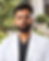 Dr. Saif Ahmad in a white coat