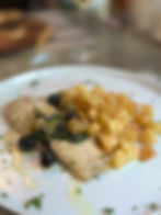 Filetto di branzino all’acqua pazza con patatine al forno