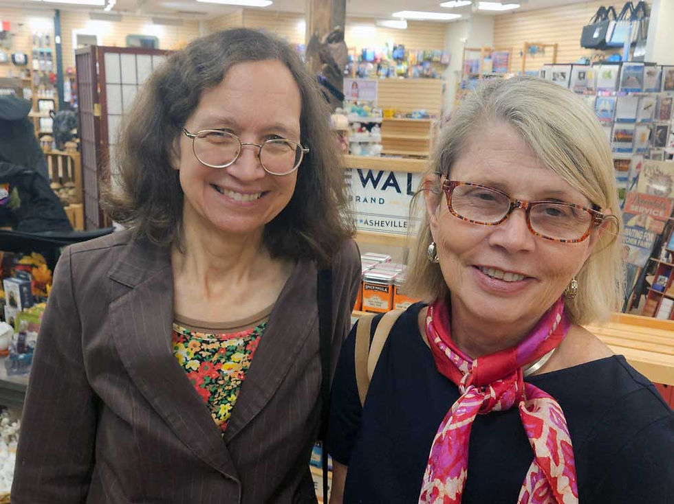 Two Homeport employees inside the Essex Junction store.