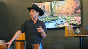 Rocket speaks about AI and technology for small businesses during an event at Black Flannel in Essex, Vermont.