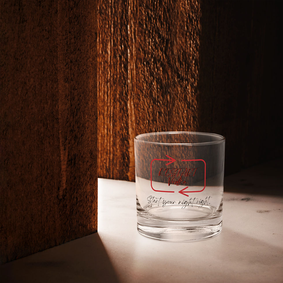 Thumbnail: Restart Vodka rocks glass with red logo on a marble surface.