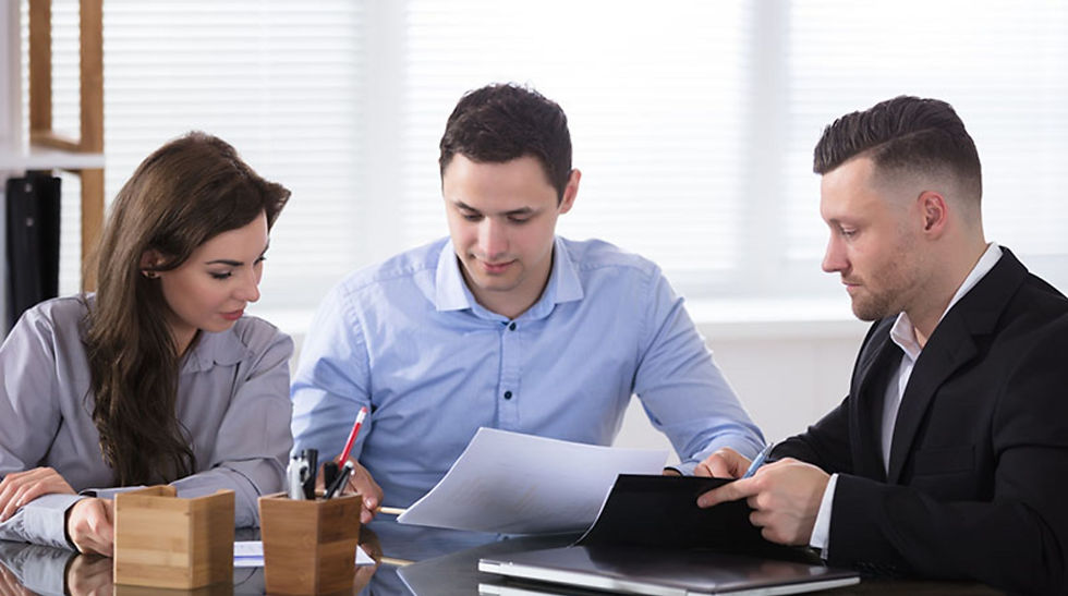 Bookkeeper and law firm attorney reviewing CTAPP compliance and tax preparation records