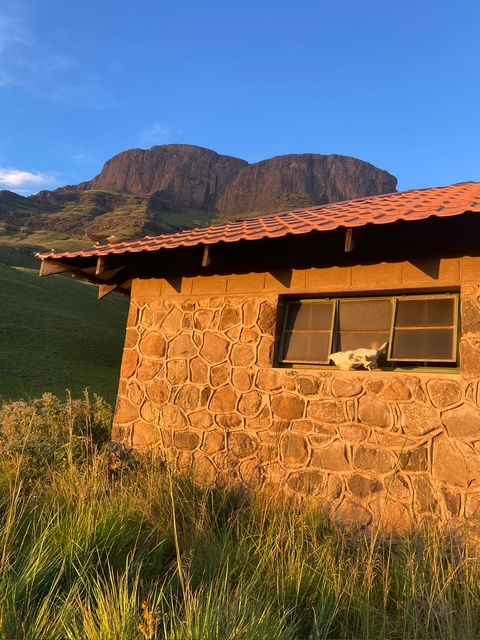 The morning sun illuminating the hut