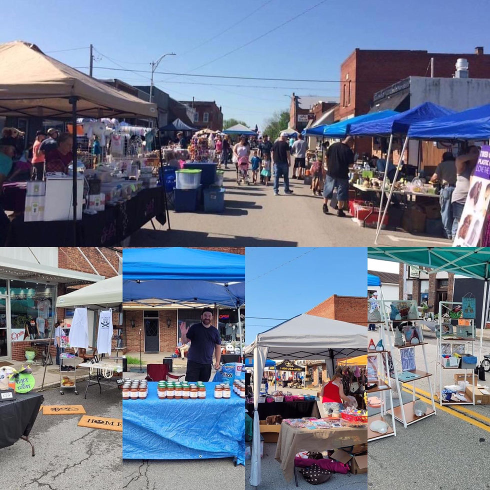 Various vendors and canopies at the open air market in knob noster