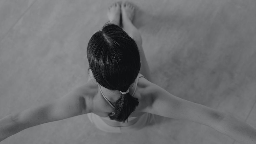 Person practicing body awareness and embodiment coaching. Embodiment coaching supports self-awareness, emotional regulation, leadership development, and sustainable personal and professional growth.