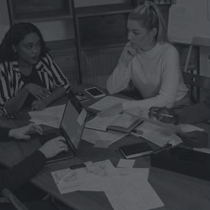 multicultural team collaborating in a cross-cultural work environment