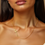 Thumbnail: 14k Yellow Gold Necklace with a Polished Cross Design