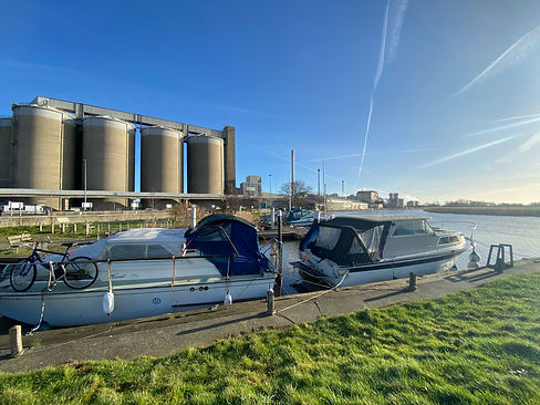 Boats on the River Yare at Cantley with Cantley British Sugar factory in background