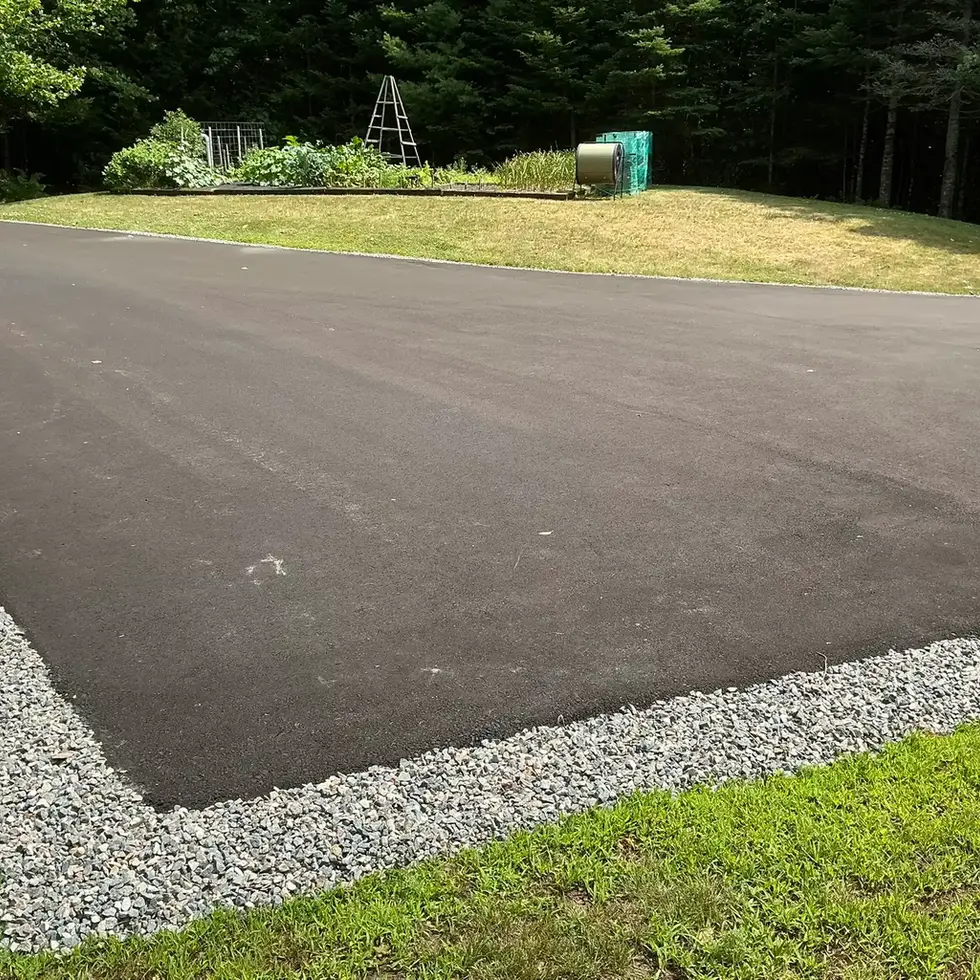asphalt driveway edged in stone