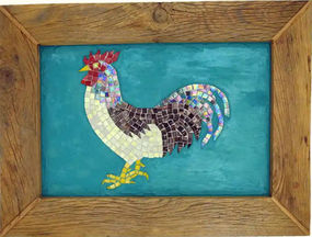 framed mosaic rooster on a turquoise plaster background