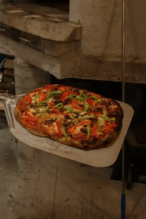 wood-fired pizza with toppings
