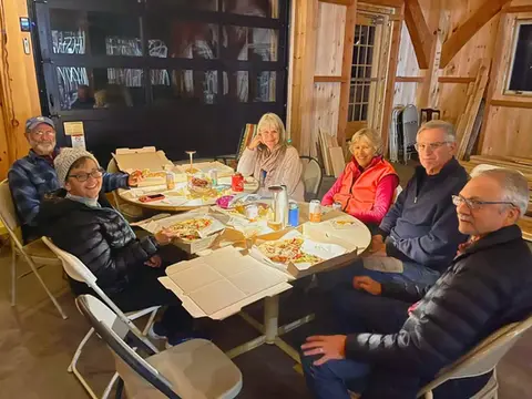 group of people having pizza