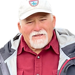 portrait of a man wearing a baseball cap
