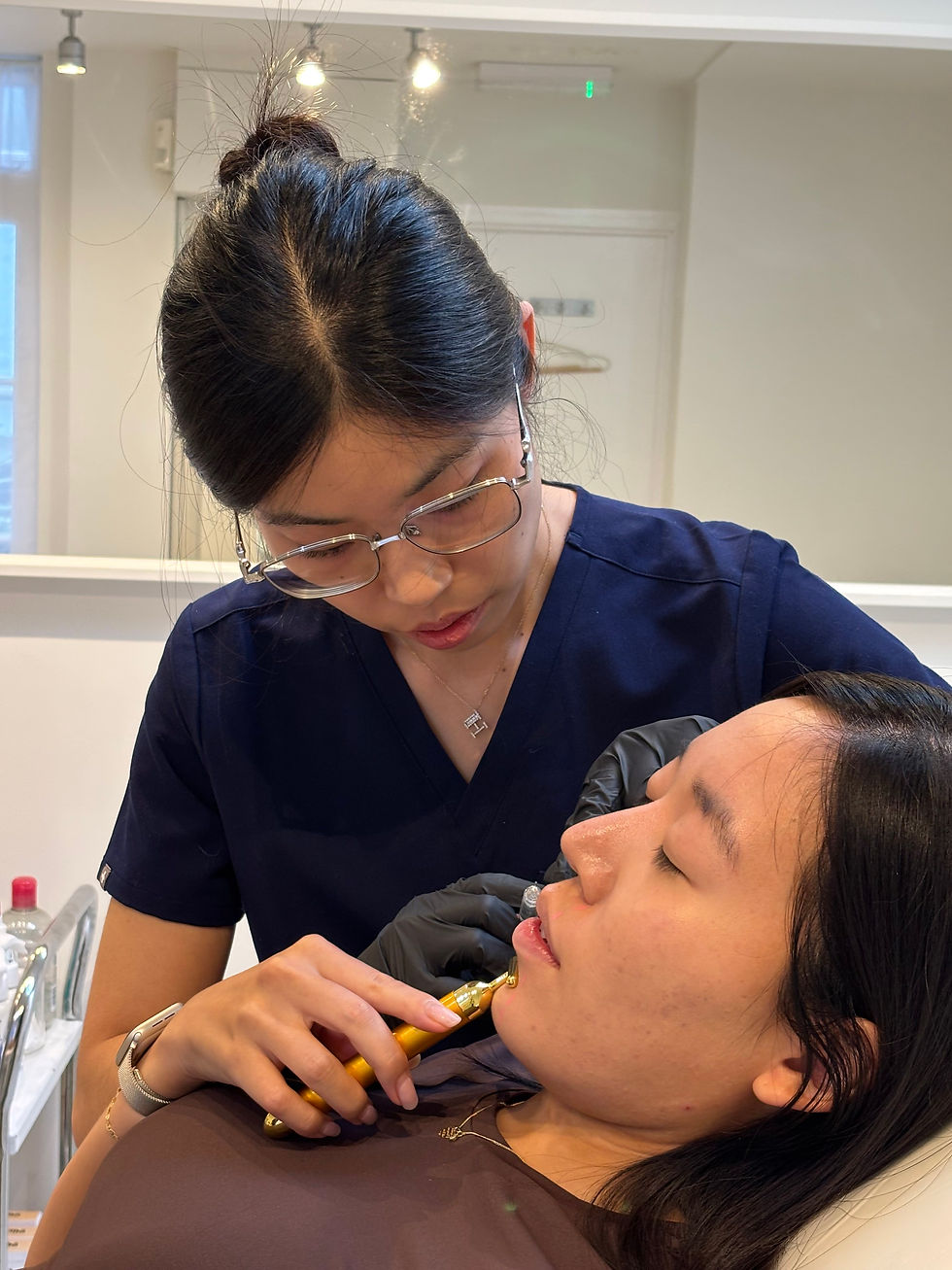 Dr. Haram in progress with a lip enhancement treatment