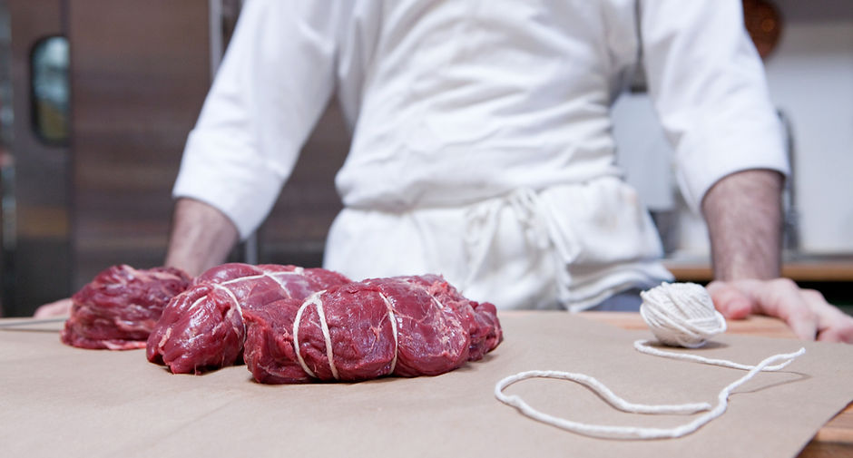 Butcher with Beef