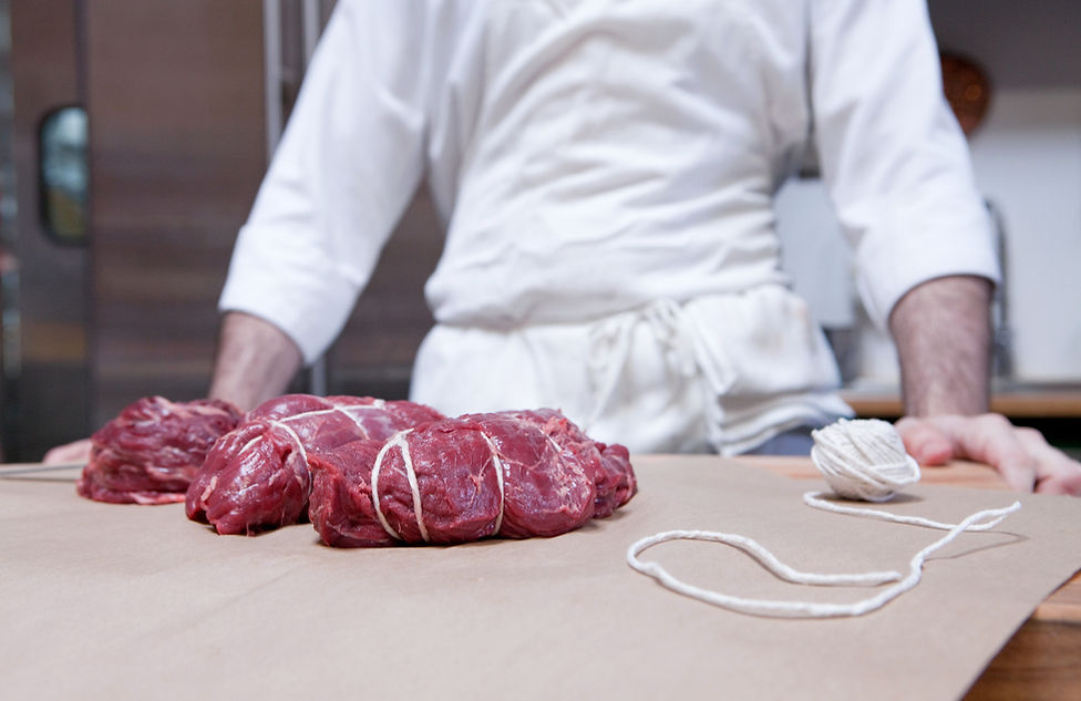 Butcher with Beef
