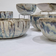 collection of multicoloured bowls