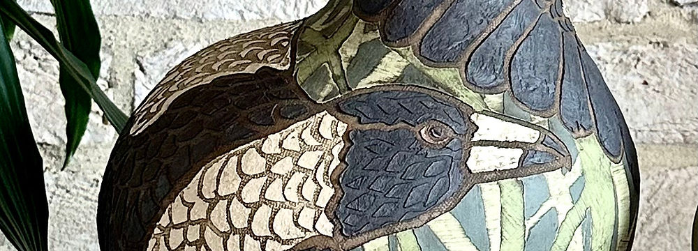 A vase with magpie decoration