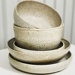 stack of beige ceramic bowls