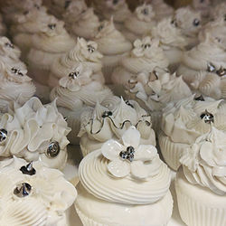 a tray of porcelain cupcakes