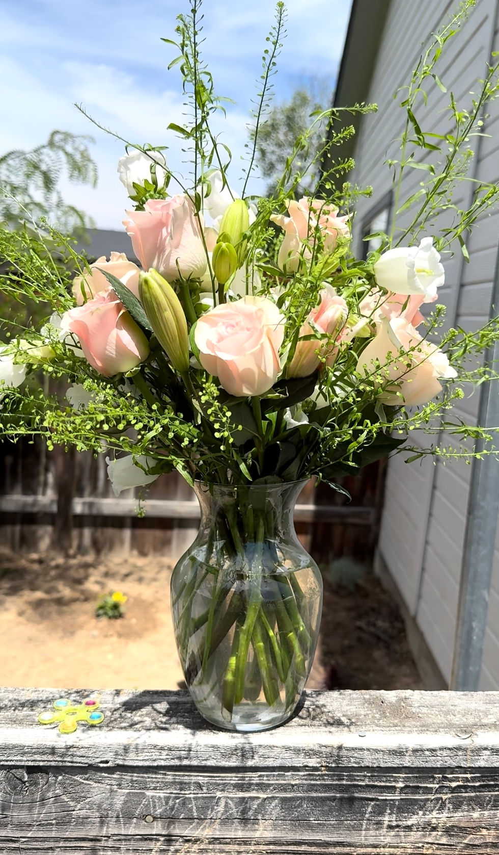 Light pink rose, white bells condolences flower arrangement