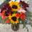 Thumbnail: sunflower purple flower orange rose floral arrangement delivered