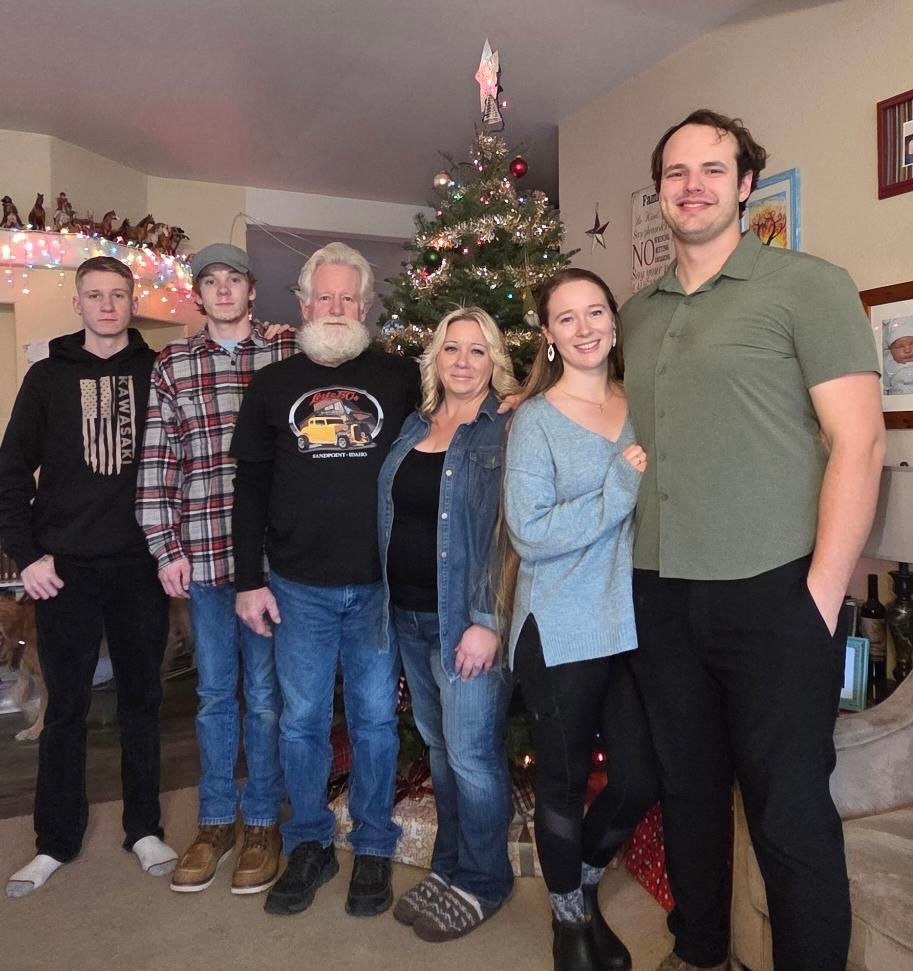 A Christmas photo with our tree.