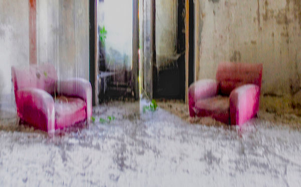 Evocative mixed-media photographic artwork capturing two faded armchairs bathed in soft light, merging abandoned interior textures and subtle colour dynamics to explore memory, decay and aesthetic stillness.