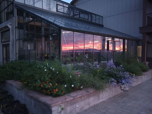 Eden's Vista sunrise reflected off the greenhouse.jpg