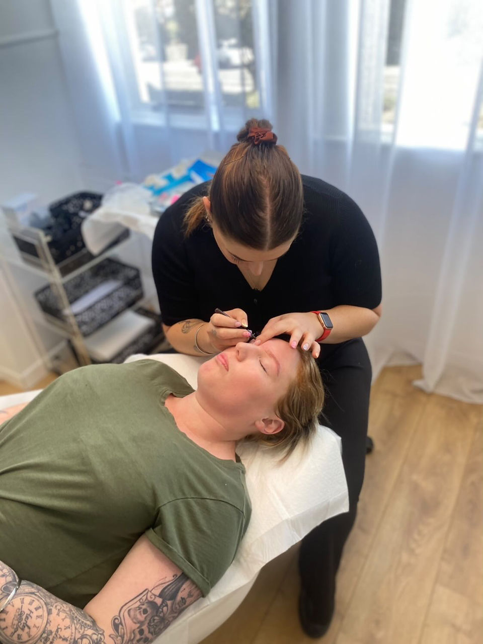 courtney mapping out the eyebrows