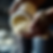Hands pour flour from a jar, creating a cloud of powder protein or creatine against a dark background. The scene feels tactile and focused, with earthy tones.