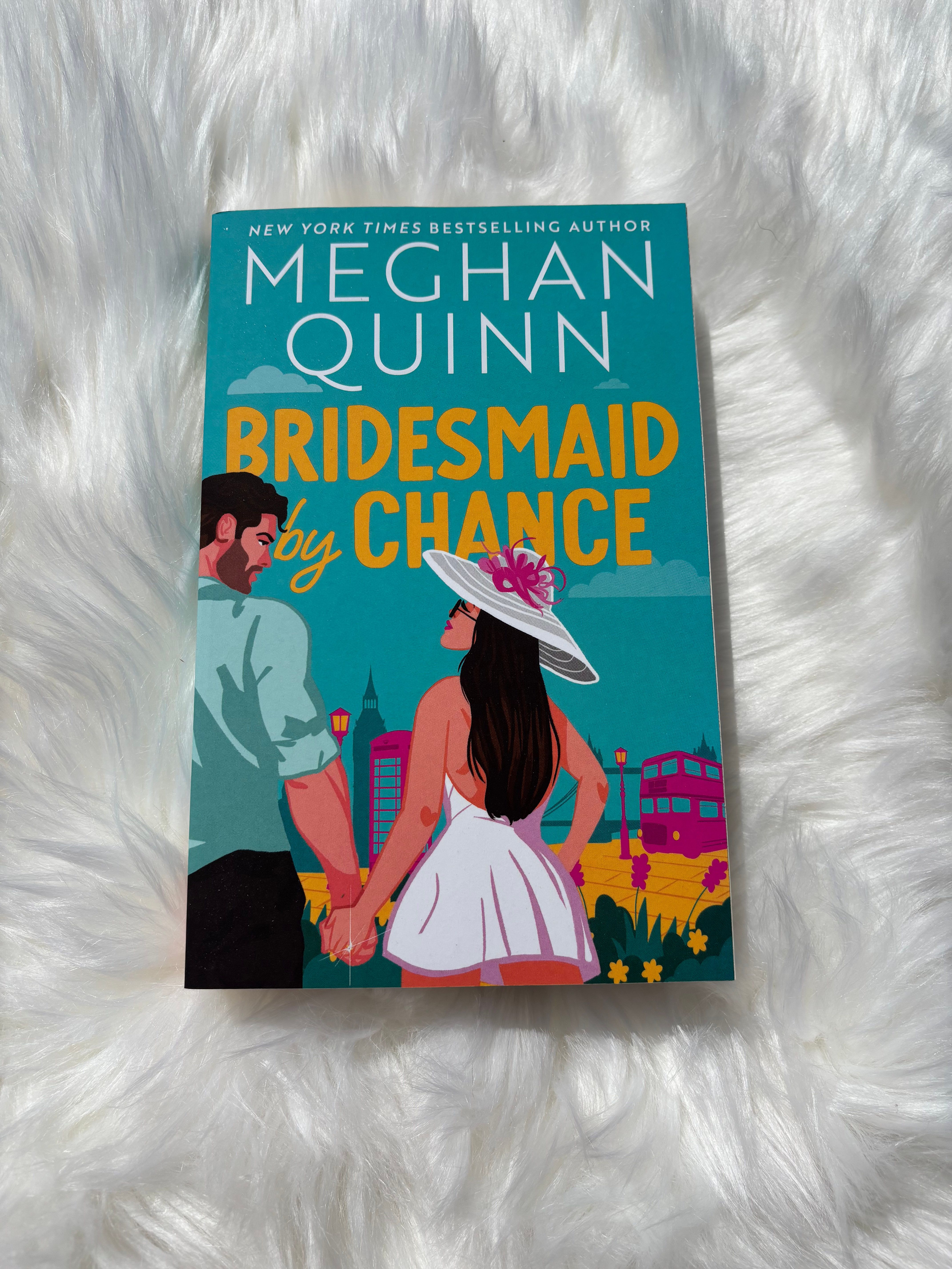 Meghan Quinn's "Bridesmaid by Chance" with couple illustration on teal background.