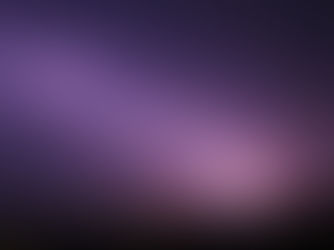 Lightening flashing across a dark purple sky.