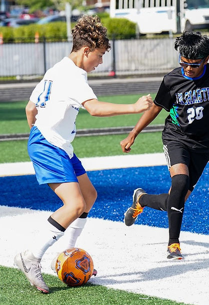 Sullivan Phillips Soccer Dribbling Past a Defender