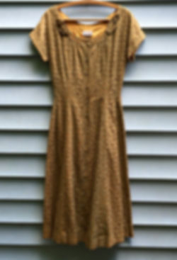 Jeanne Durrell of Dallas dress with olive green lace overlay
